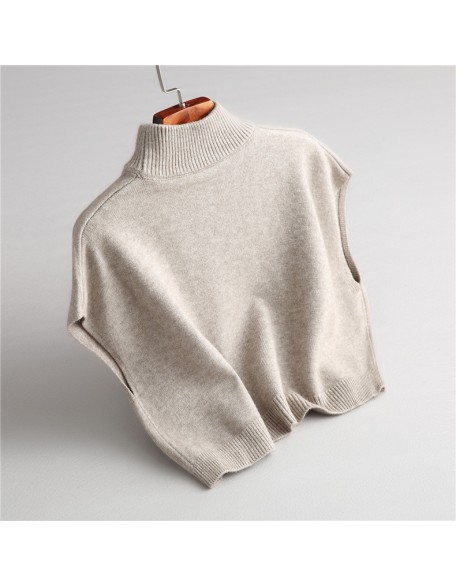 Wearing a low necked small stature with a high necked knitted pullover